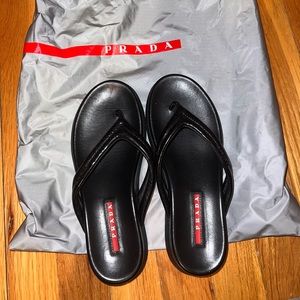 Prada flip flops. Never worn. Size 35.5